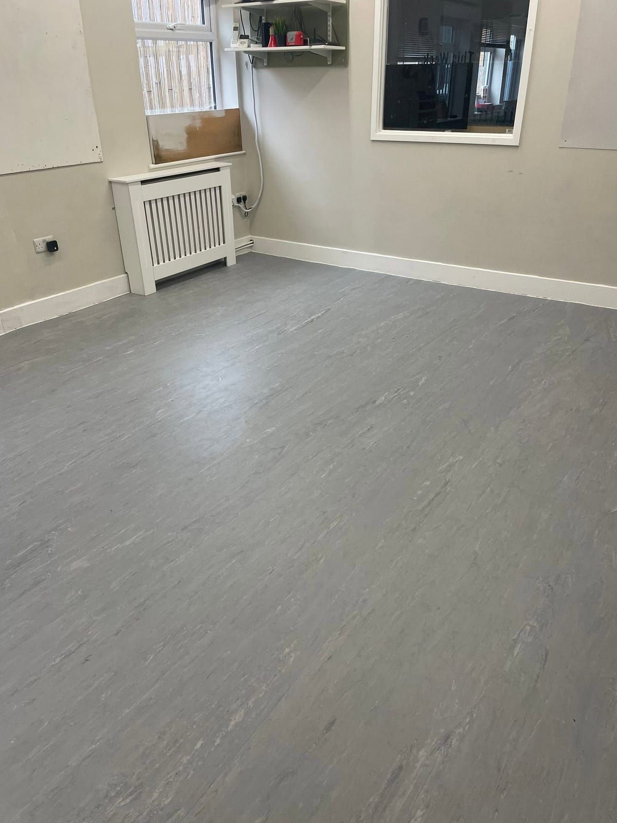 Grey marbled sheet vinyl in a nursery room