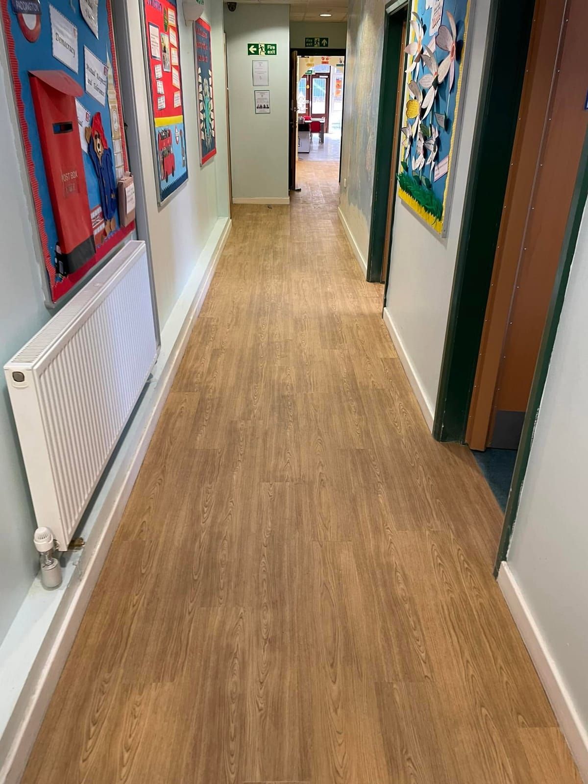 Wood-effect vinyl in a school corridor