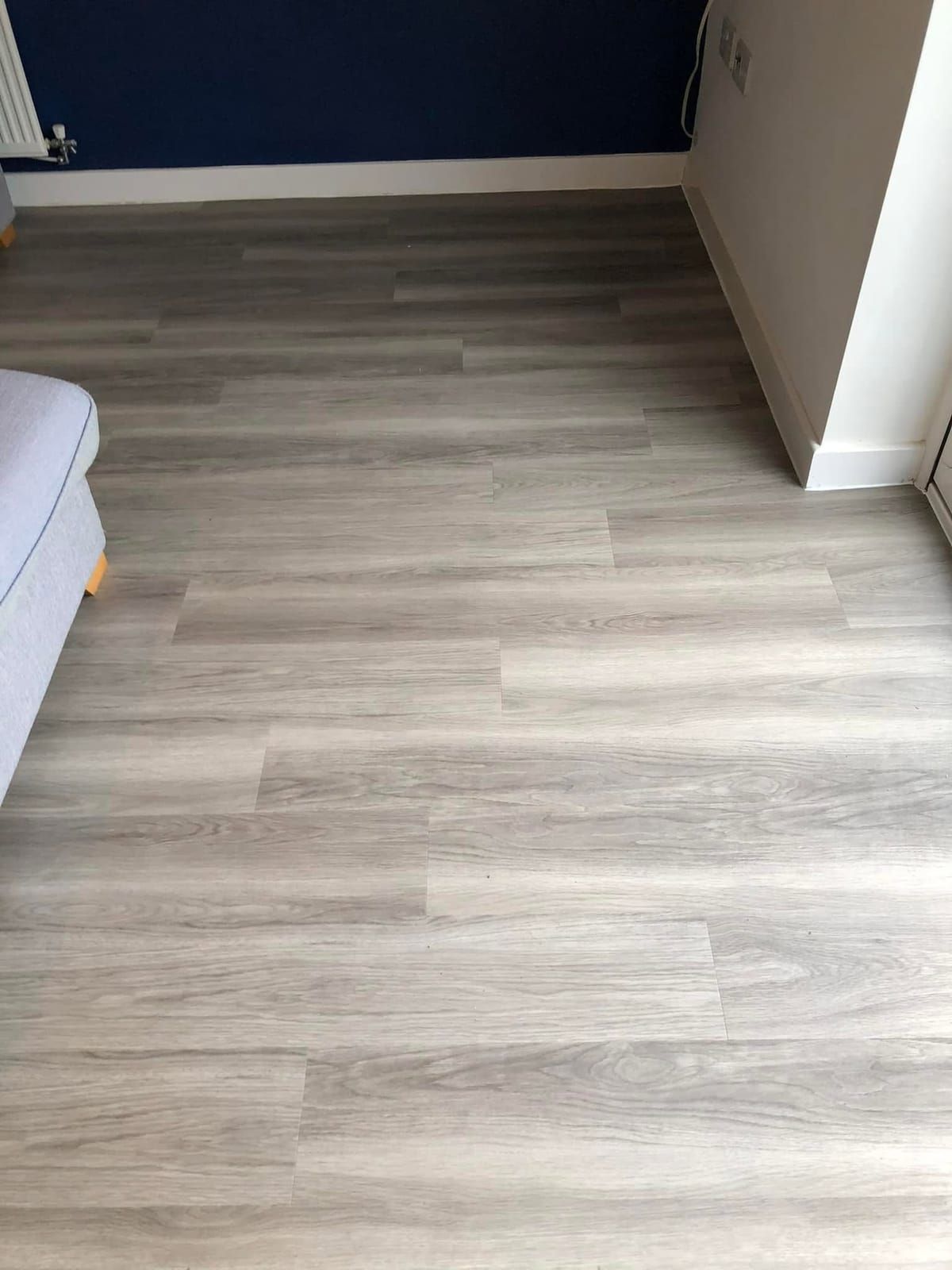 Grey oak laminate in a hallway