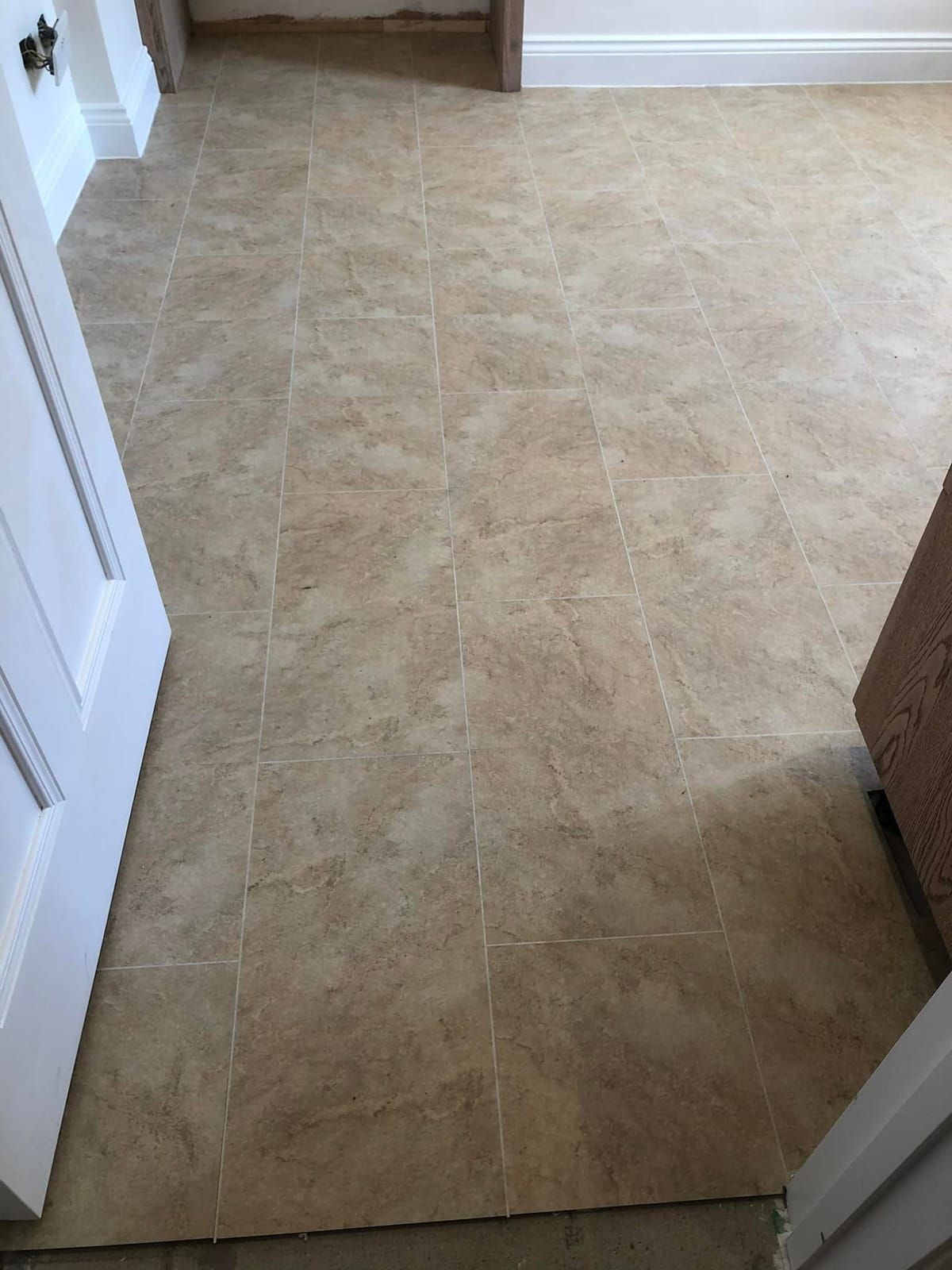Stone tile-effect vinyl in a hallway